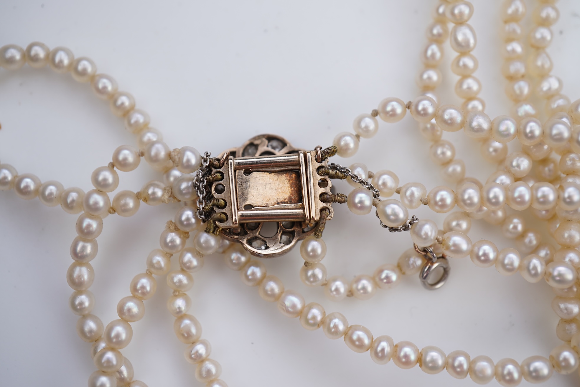 A pearl and diamond necklace, 19th century and later